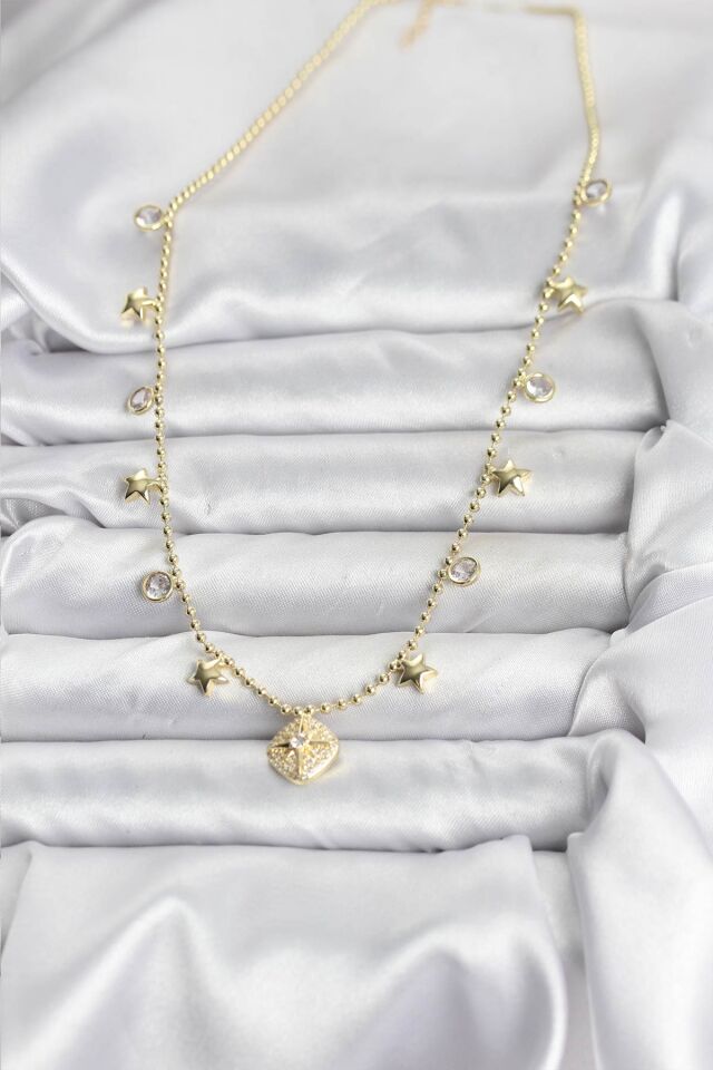 Pirinç Gold Renk Zirkon Taşlı Kutup Yıldızı Model Kadın Kolye