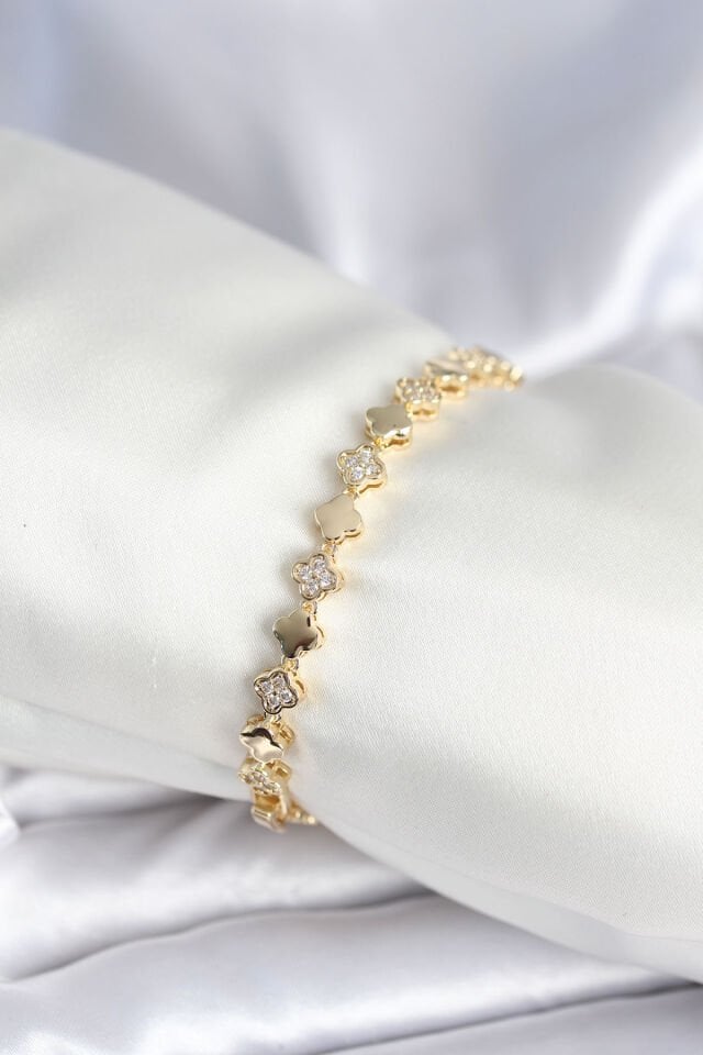 Pirinç Gold Renk Zirkon Taşlı Yonca Model Kadın Bileklik