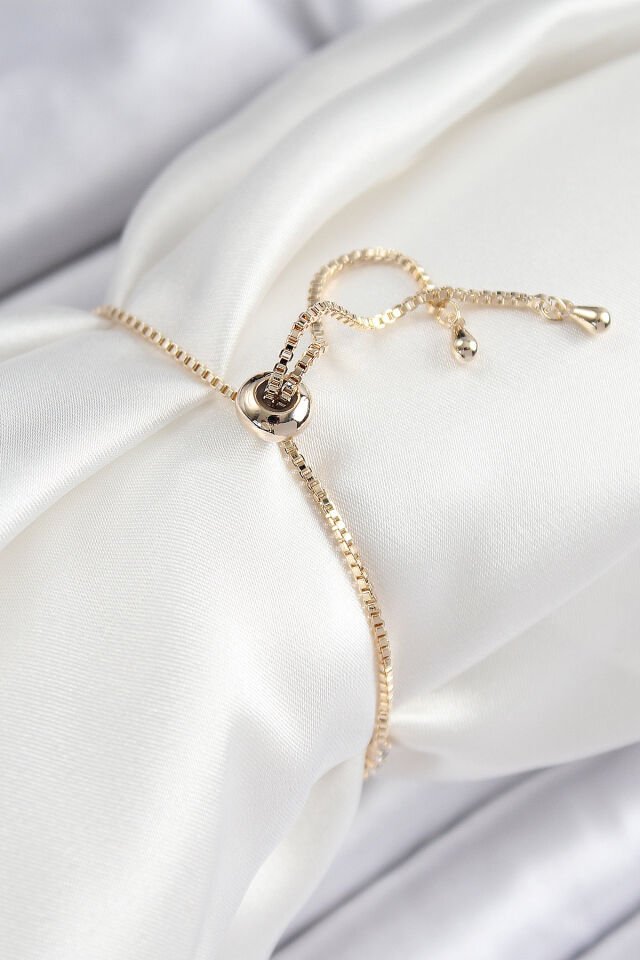 Pirinç Zirkon Taşlı Kutup Yıldızı Model Gold Renk Asansörlü Kadın Bileklik